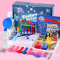 Ensemble d'expériences avec tubes à essai et produits colorés sur fond rose