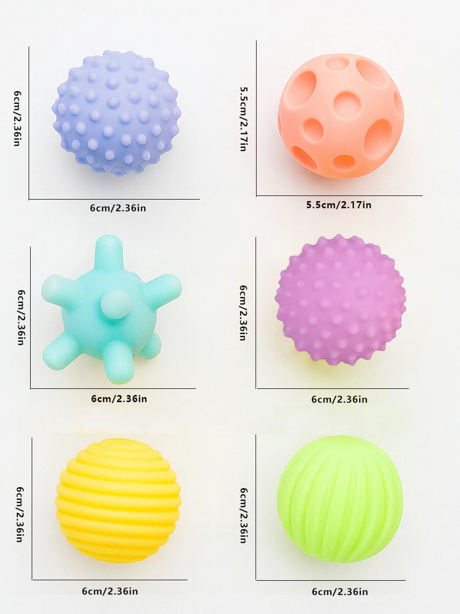 Set complet de 6 balles sensorielles pastel avec textures variées et boîte de rangement.